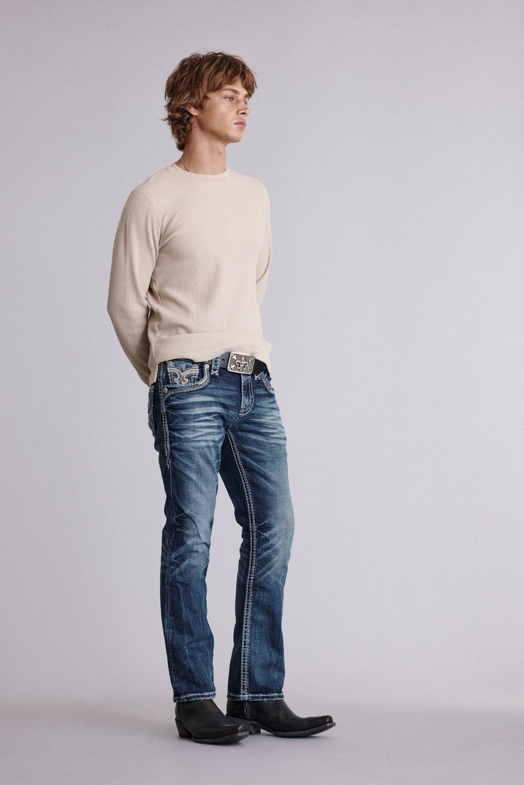 Rock Revival Jadyn Bootcut Jeans in Medium Wash, side view on model