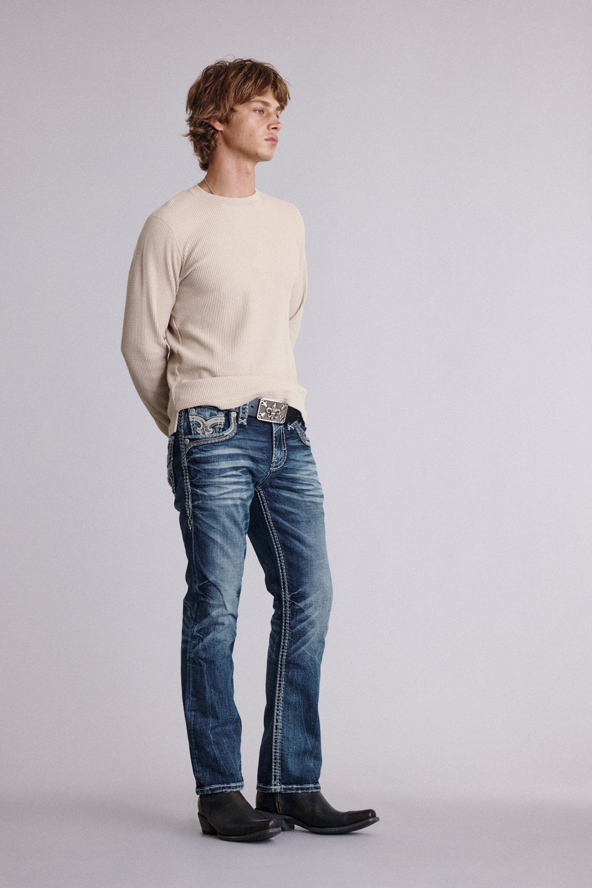 Rock Revival Jadyn Bootcut Jeans in Medium Wash, side view on model